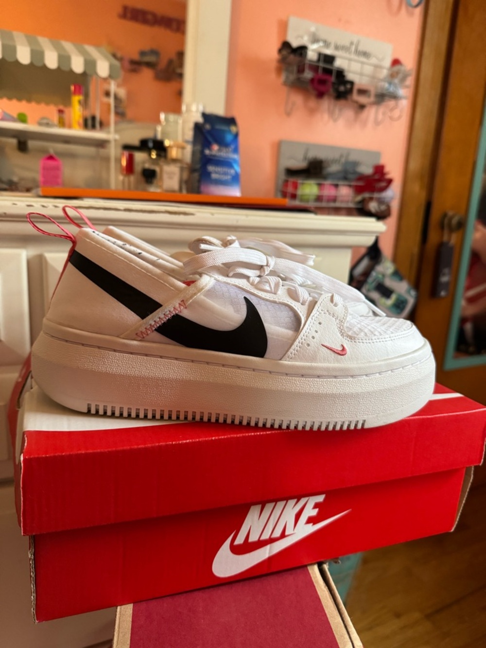Nike White Sneakers with Black Swoosh and Pink Insole